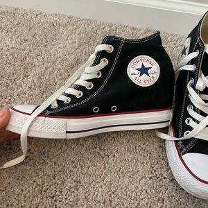 High top converse that have a heel.